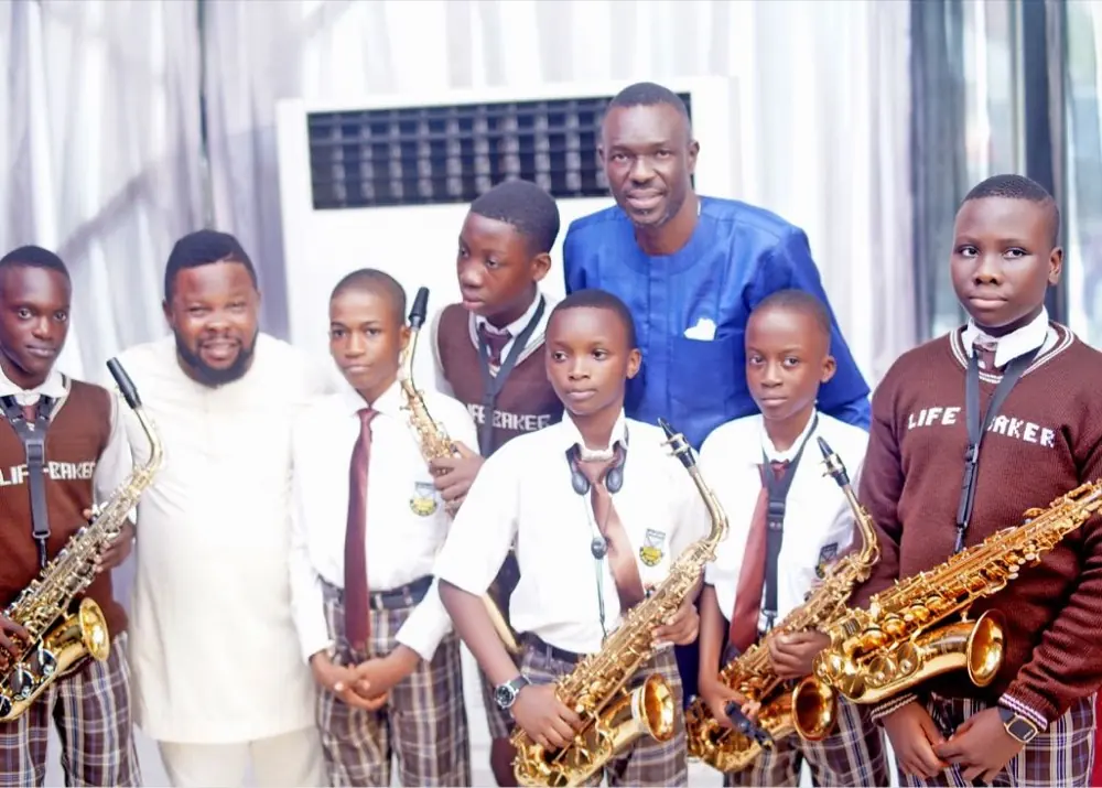 The Life Baker school band with their instructors after a performance
