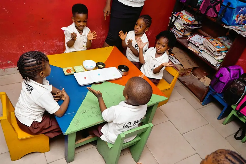 Toddlers playing on the soft floor mats