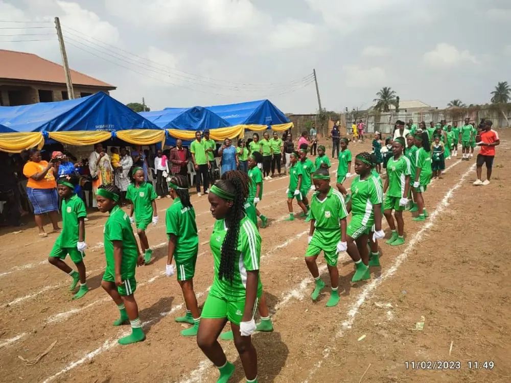 Primary pupils marching at the inter-house sports festival